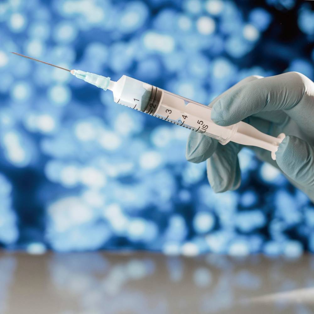 Sharing contaminated needles or syringes